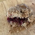 Flapjack bars with a layer of blackberries in the middle